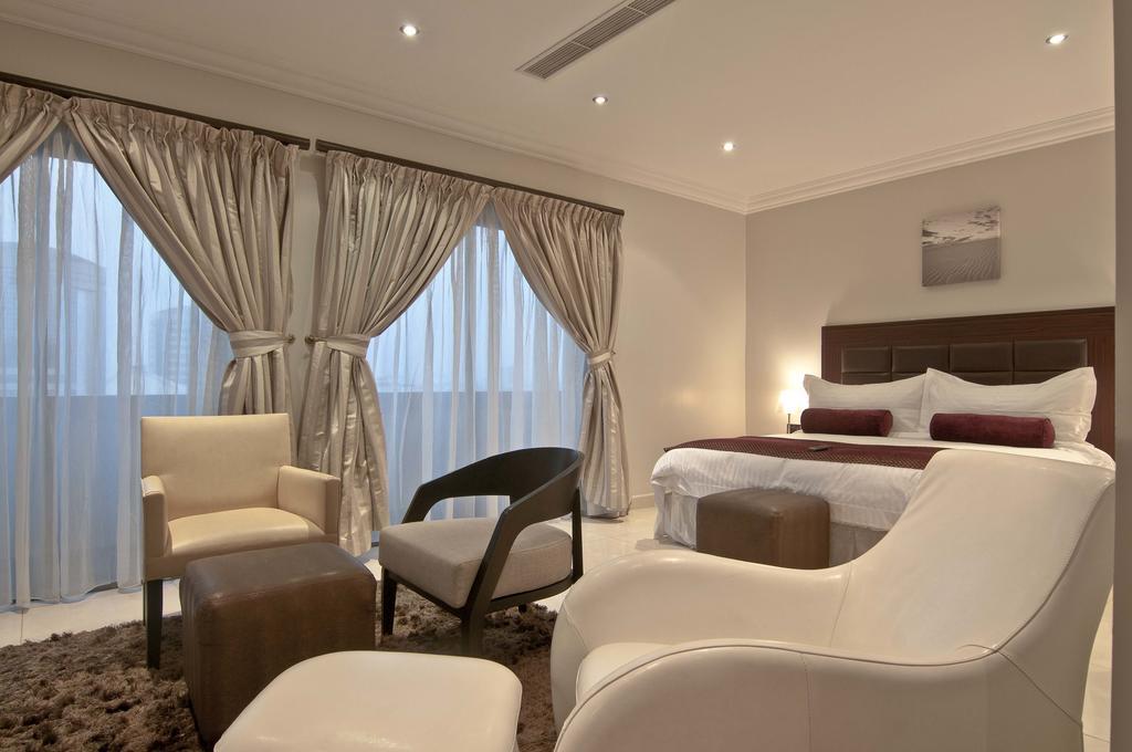 L'Eola Suites Абуджа Стая снимка