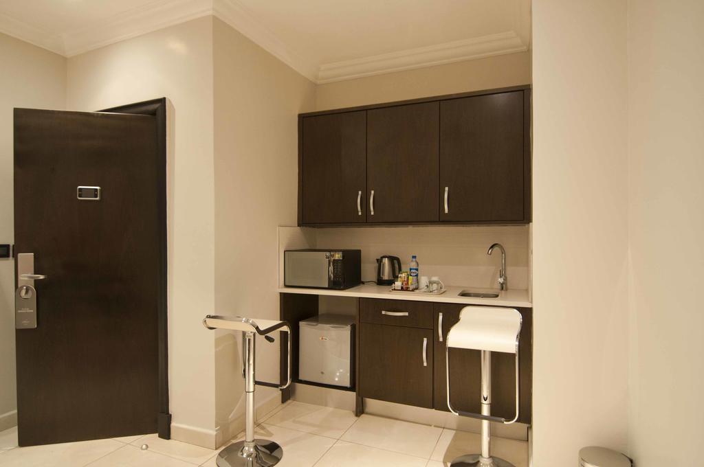 L'Eola Suites Абуджа Стая снимка