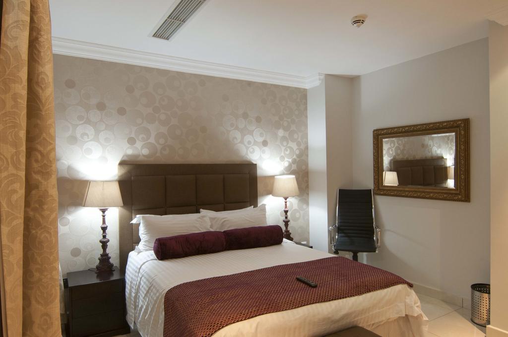L'Eola Suites Абуджа Стая снимка
