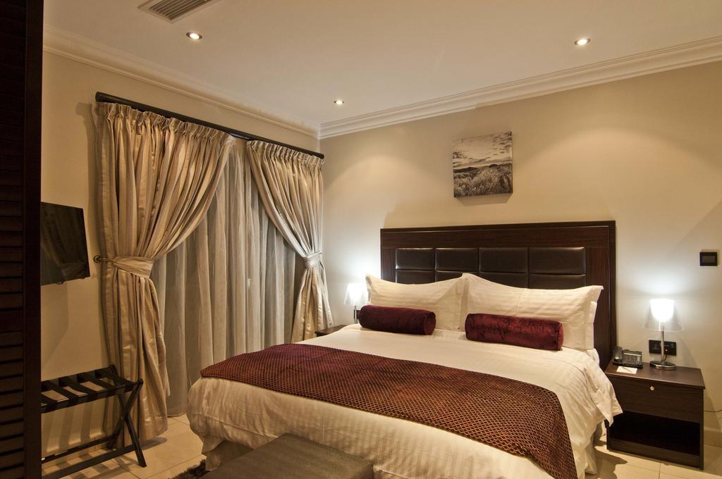 L'Eola Suites Абуджа Стая снимка