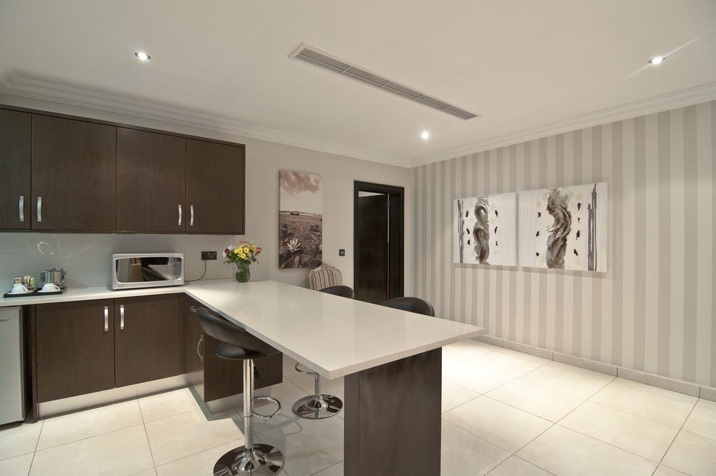 L'Eola Suites Абуджа Стая снимка