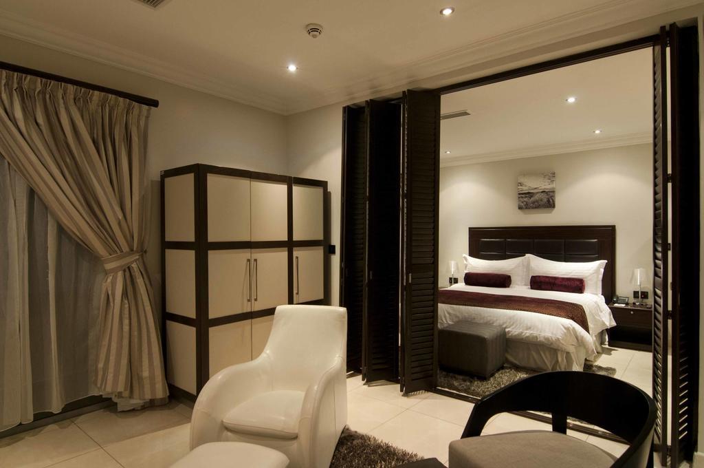 L'Eola Suites Абуджа Стая снимка