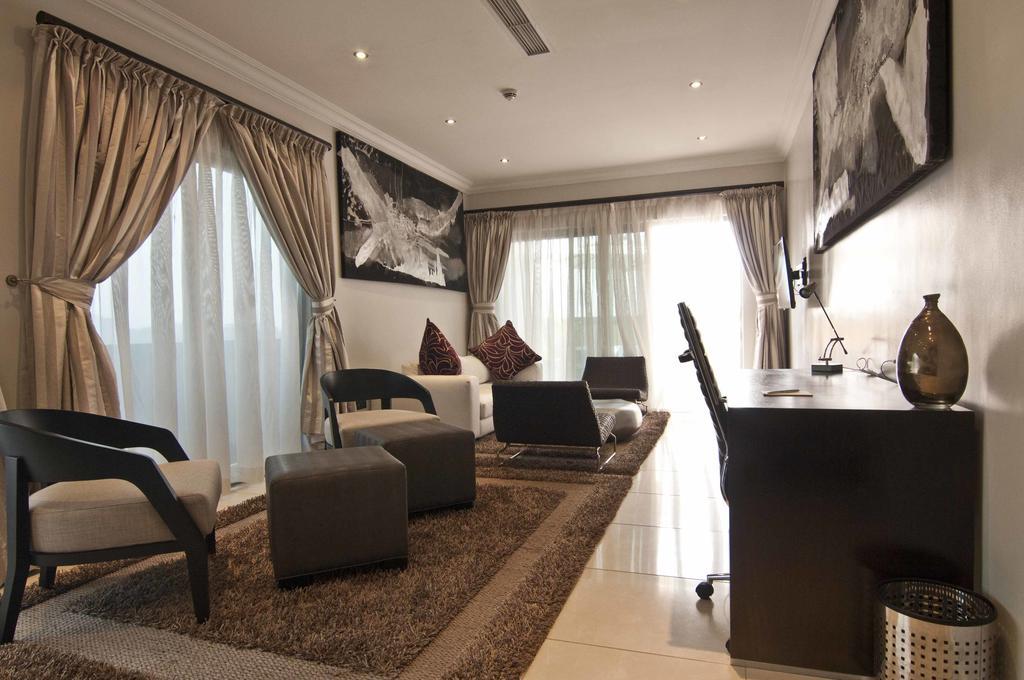 L'Eola Suites Абуджа Стая снимка